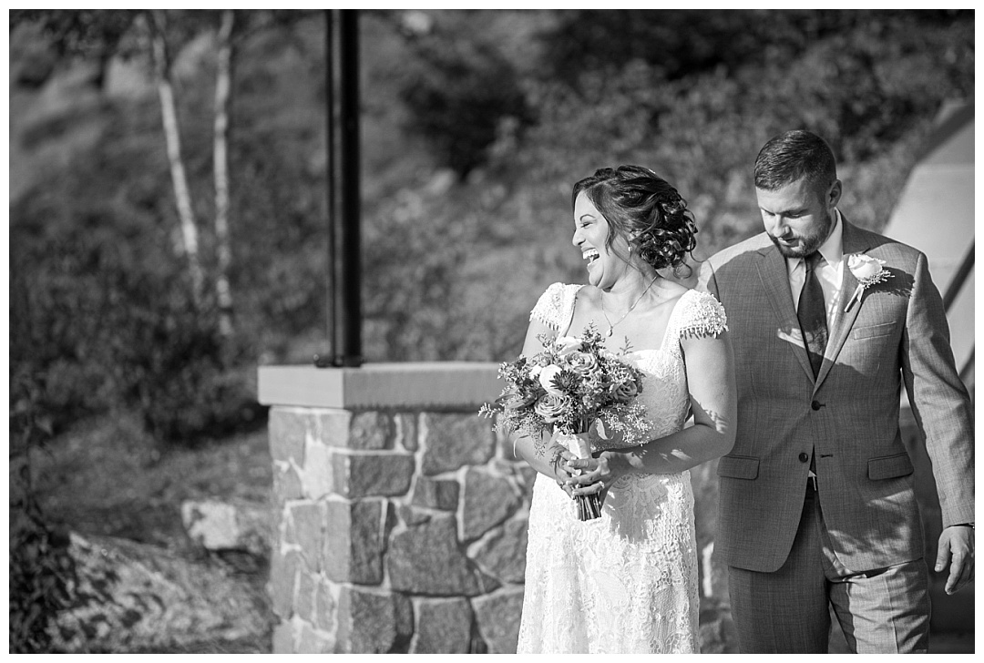 groom looking at bride