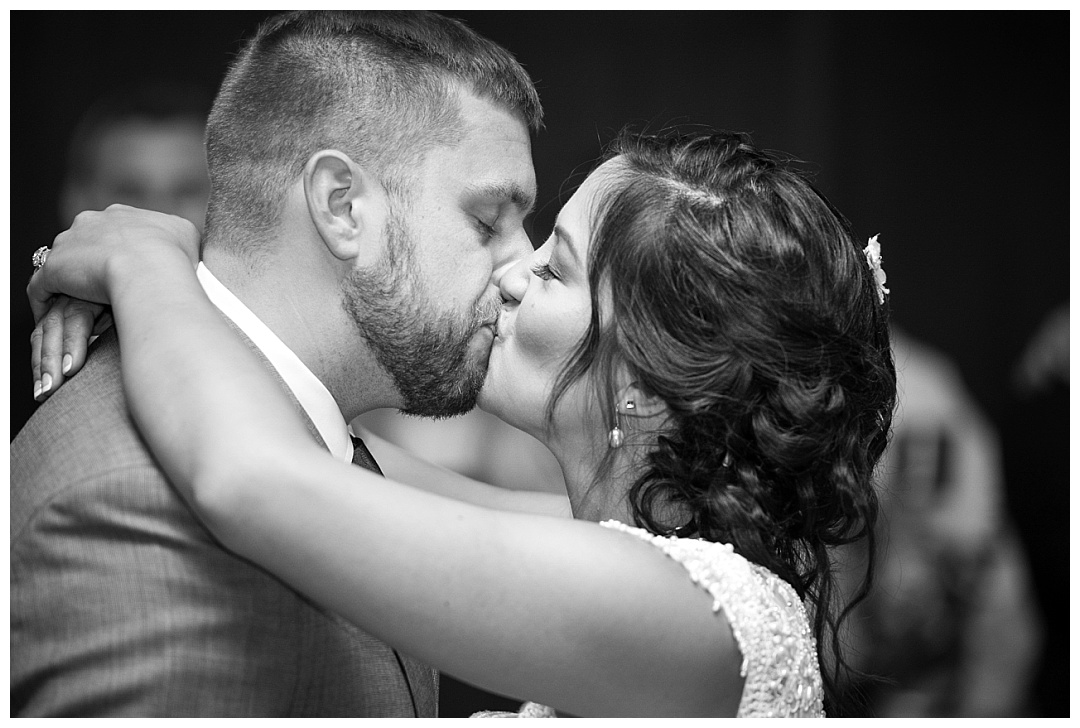 bride and groom kissing